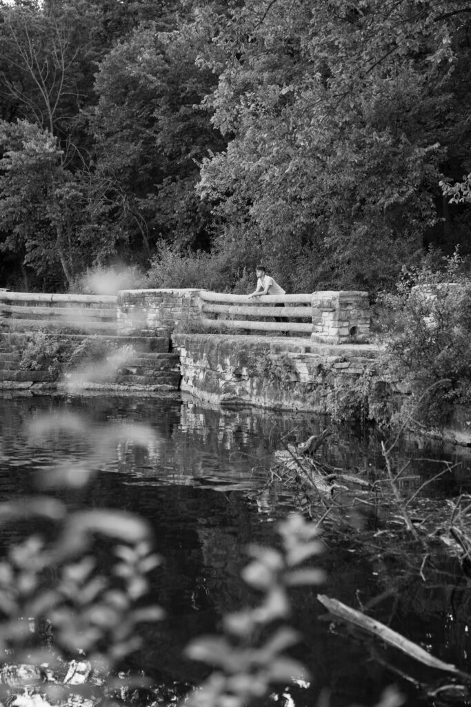 Senior portrait session at Menomonee Park quarry with Lannon stone backdrop in Menomonee Falls Wisconsin