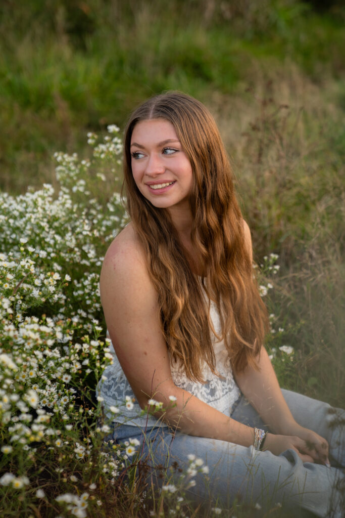 Senior photos in wildflower field at Menomonee Park near Sussex and Lannon Wisconsin