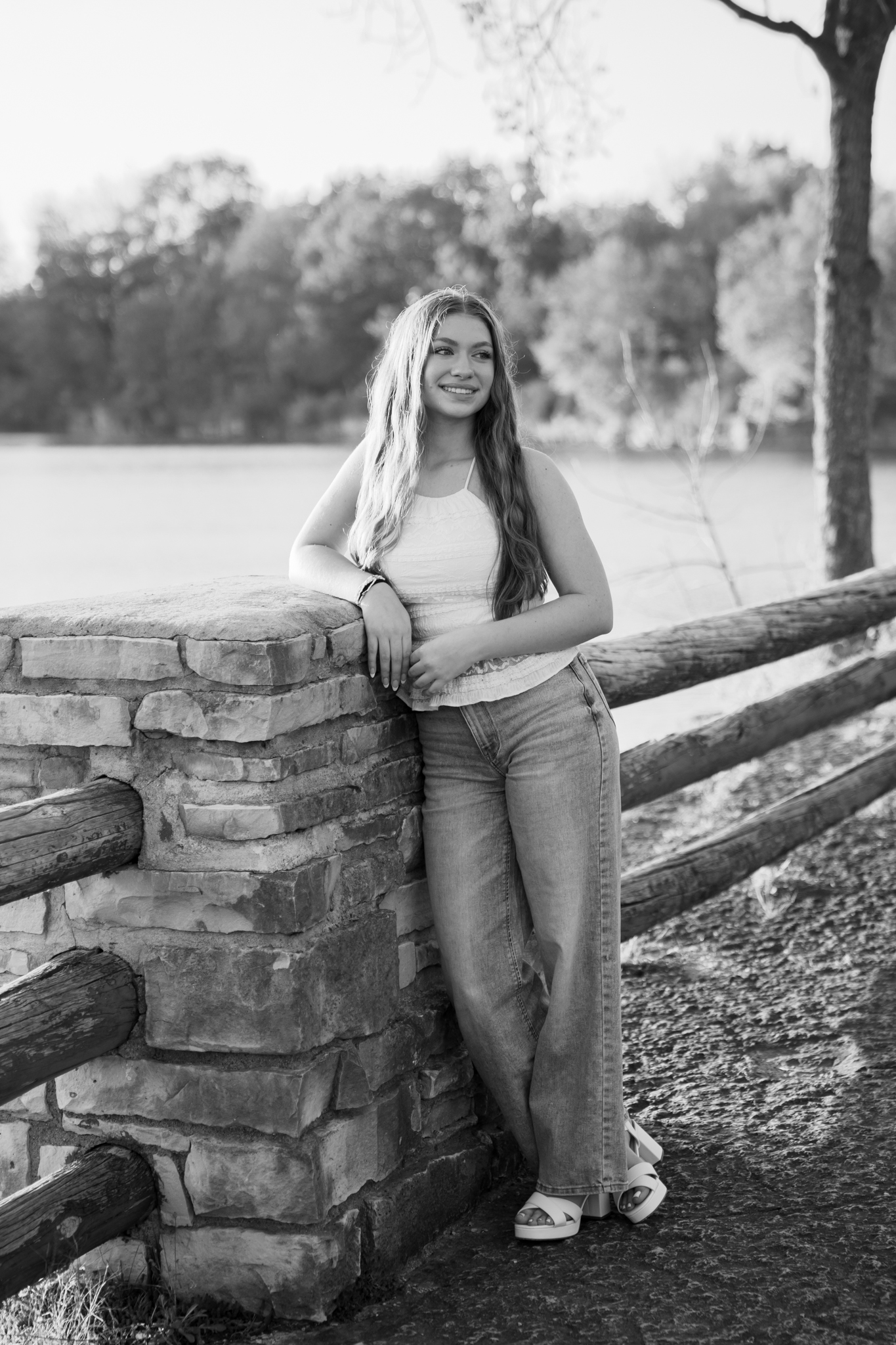 Senior girl smiling off into the distance