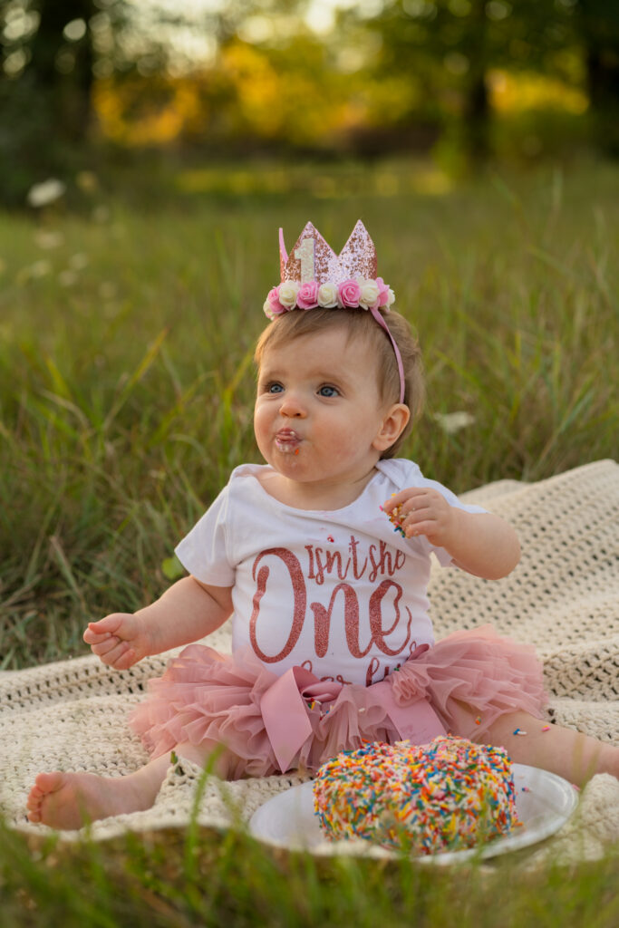Cake smash photography with playful one-year-old in Germantown area