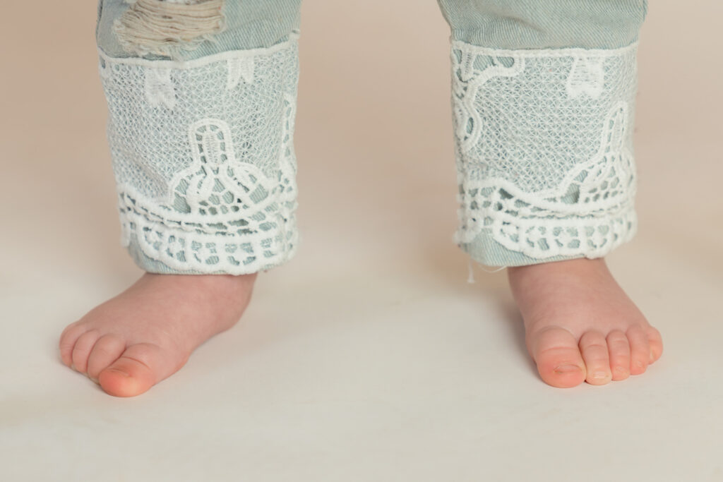 Detailed photograph of Felicity's feet during one year milestone photo session