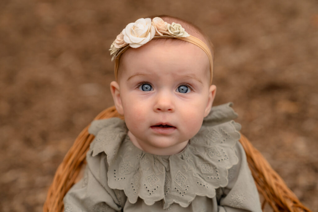 Smiling toddler during outdoor family session in Menomonee Falls WI