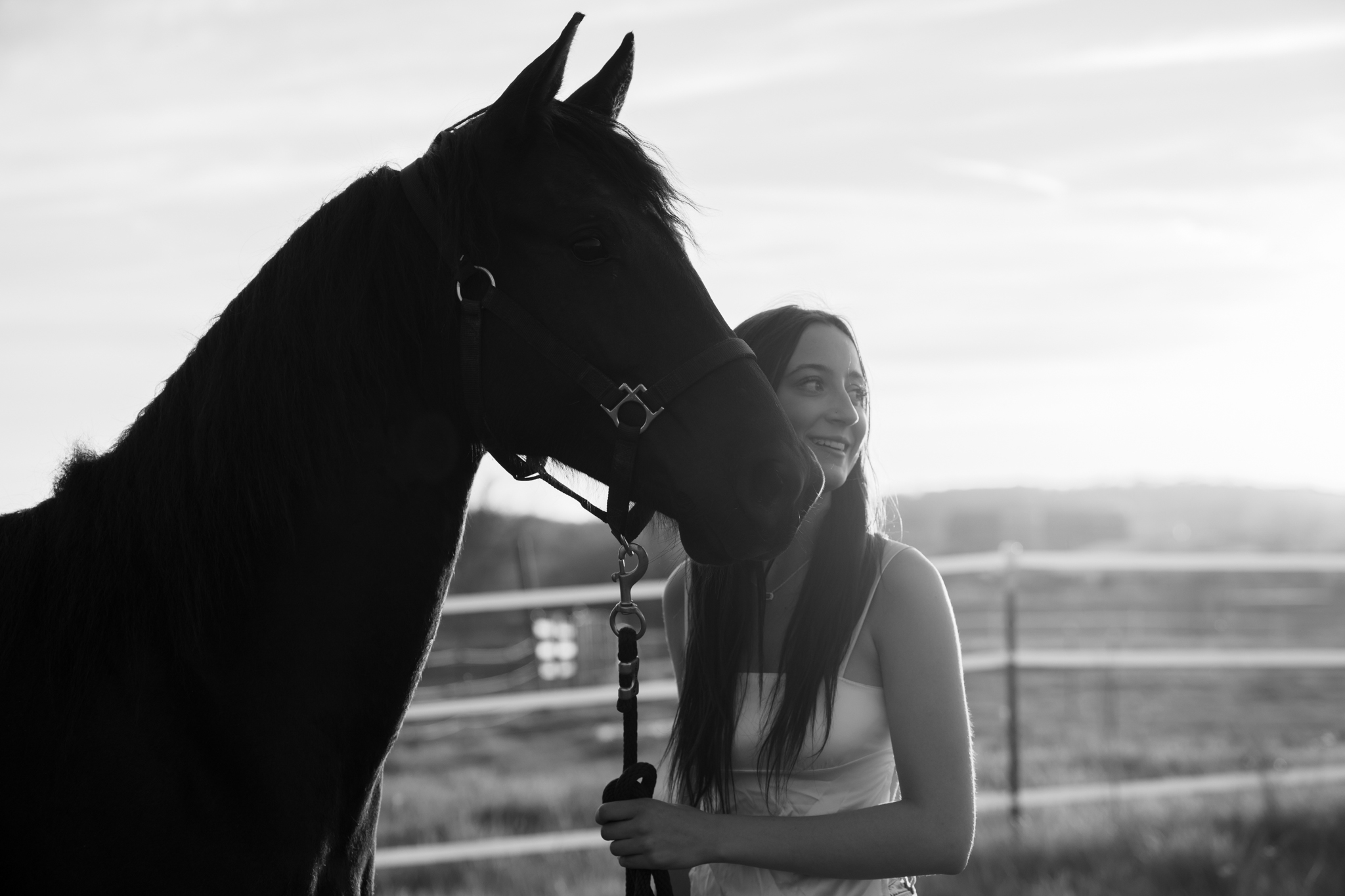 young woman posing with horse during Port Washington, Wisconsin equine photography session