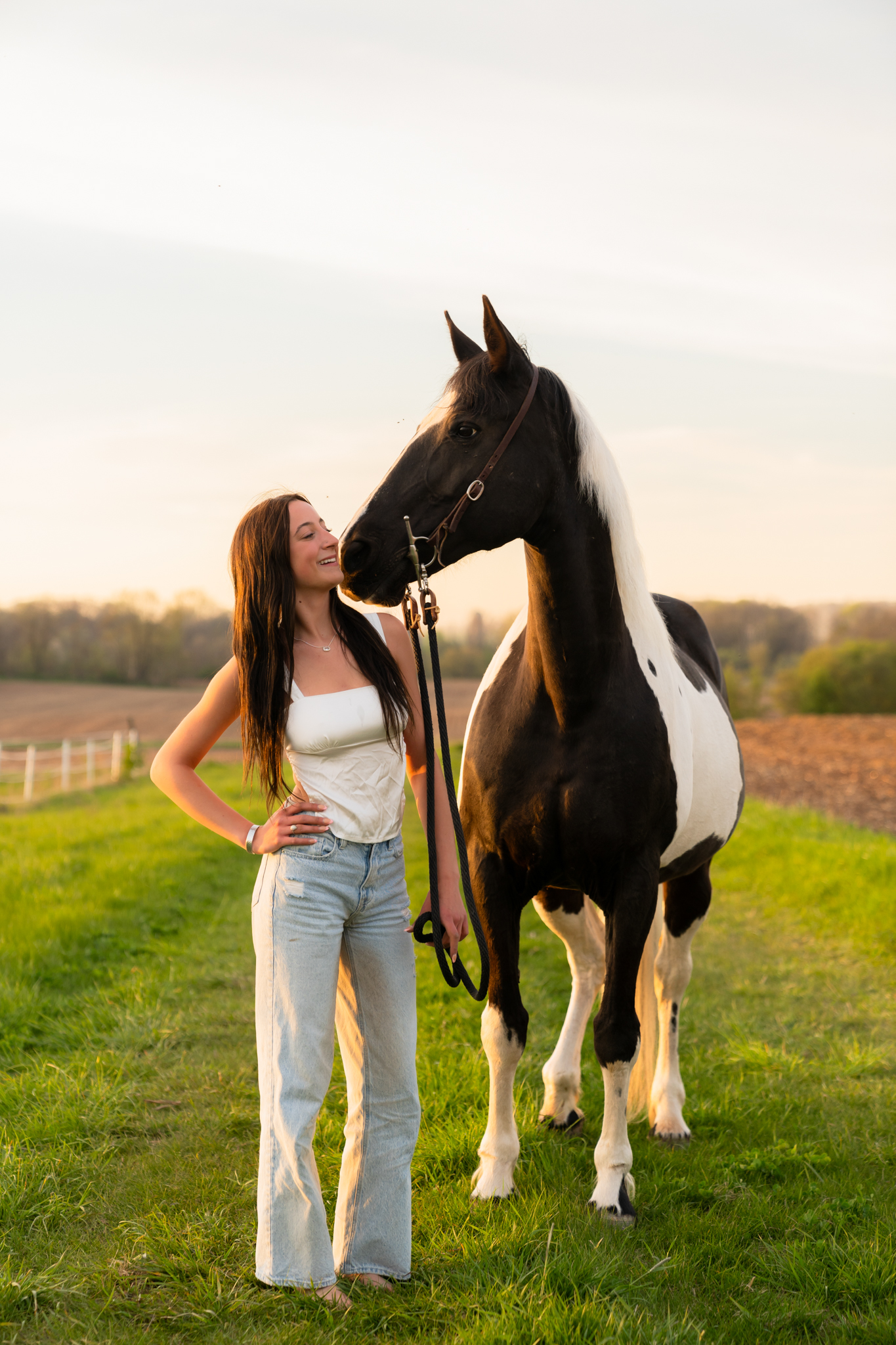 horse and rider senior portrait session in golden hour light Wisconsin