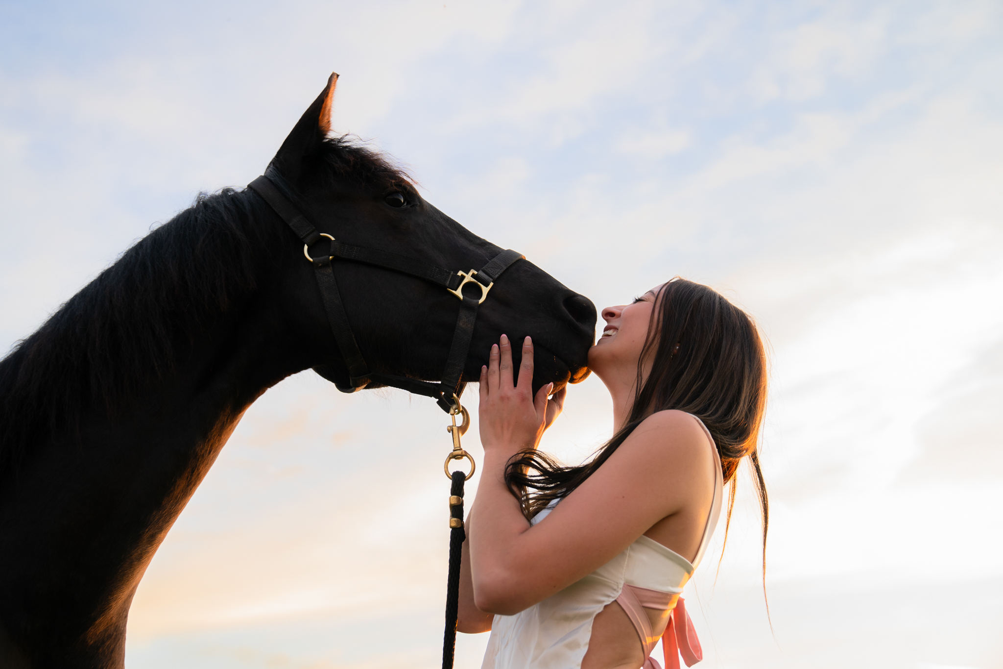 Senior and family photographer takes photo of girl with her horse in Port Washington, Wisconsin