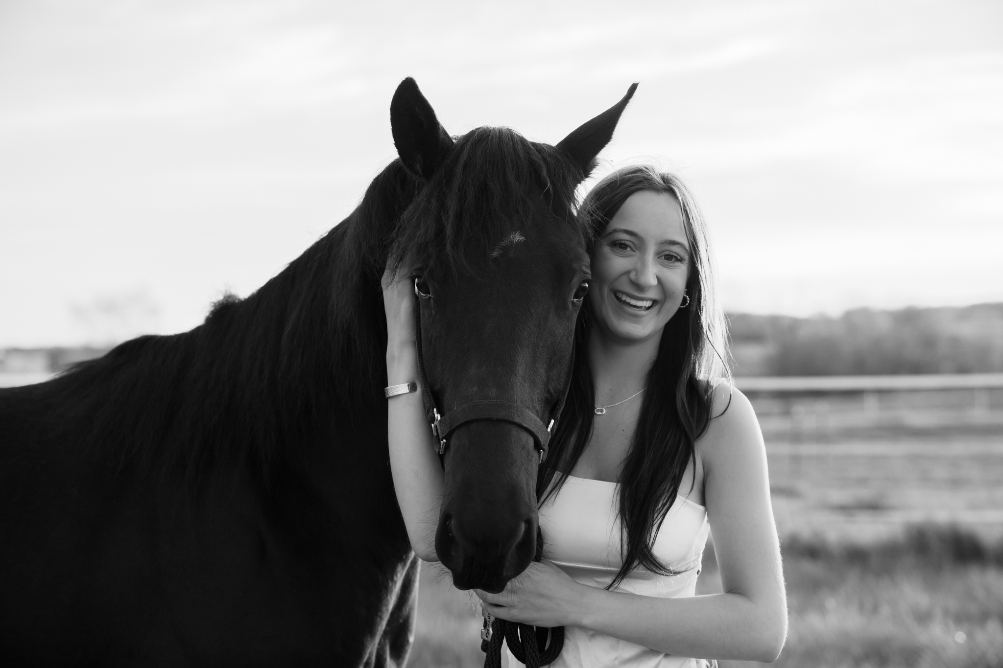 candid senior session with horse in field West Bend, Wisconsin