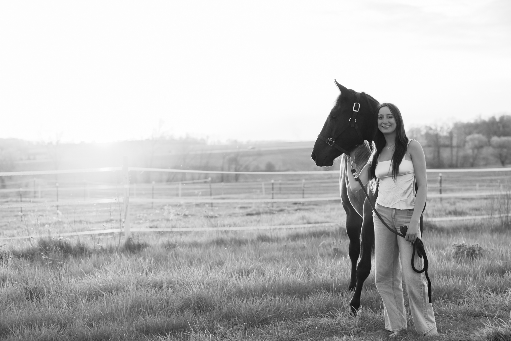 senior girl with horse during outdoor equestrian photography session