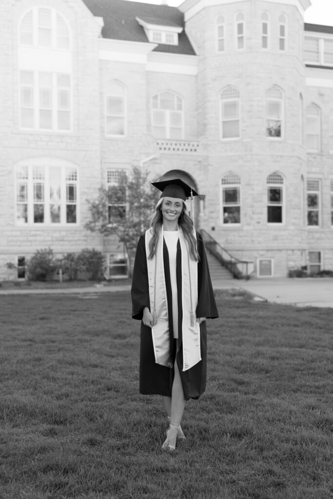 Senior photos in front of historic buildings at Carroll University